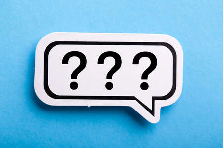 Question Mark speech bubble isolated on blue background.の写真素材