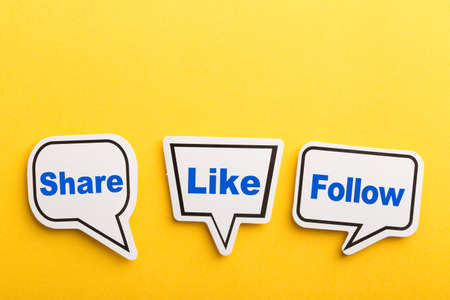 Like speech bubble isolated on the yellow background.の写真素材