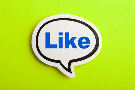 Like speech bubble isolated on the yellow background.の写真素材