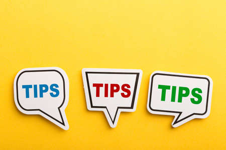Tips speech bubble isolated on the yellow background.の写真素材