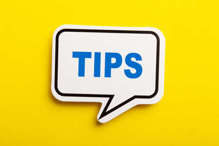Tips speech bubble isolated on the yellow background.の写真素材
