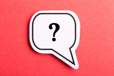 Question mark speech bubble isolated on red background.の写真素材