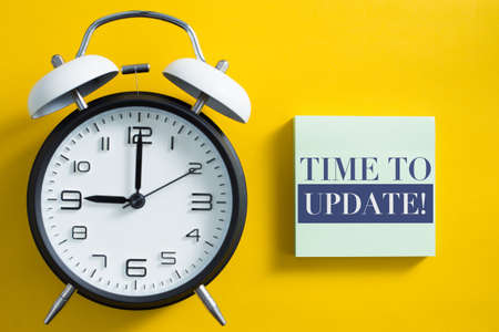 Time to update concept with alarm clock aside.の写真素材
