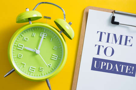 Time to update concept with alarm clock aside.の写真素材