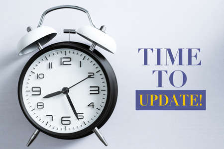 Time to update concept with alarm clock aside.の写真素材