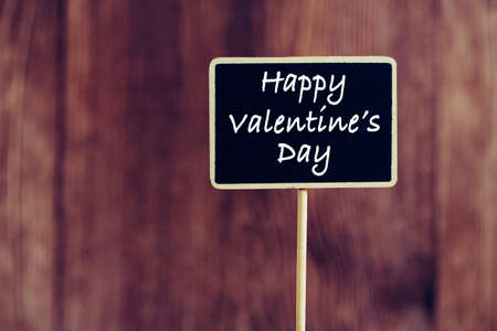 Happy Valentines Day text on blackboard sign.の写真素材