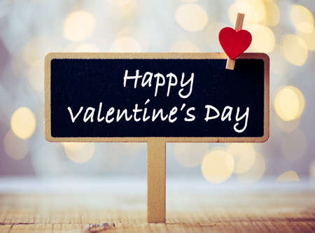 Happy Valentines Day text on blackboard sign.の写真素材