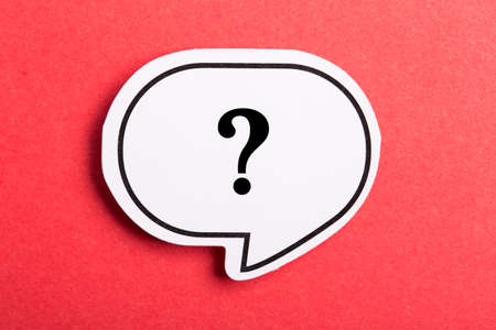 Question mark speech bubble isolated on red background.の写真素材