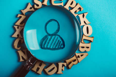 Concept of search for worker with magnifying glass.の写真素材