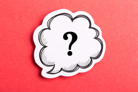 Question mark speech bubble isolated on red background.