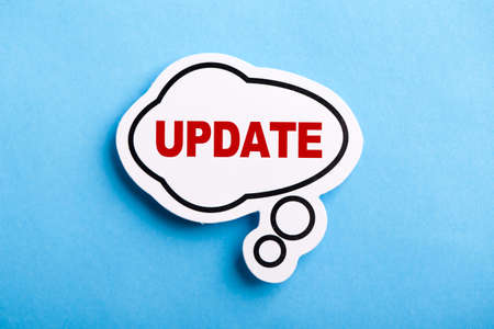 Update concept speech bubble isolated on blue background.の写真素材