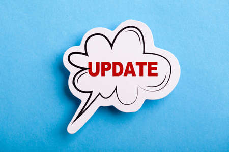 Update concept speech bubble isolated on blue background.の写真素材