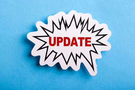 Update concept speech bubble isolated on blue background.の写真素材