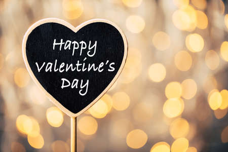 Happy Valentines Day text on blackboard sign.の写真素材