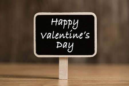 Happy Valentines Day text on blackboard sign.の写真素材