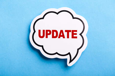Update concept speech bubble isolated on blue background.の写真素材