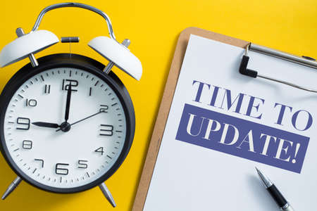 Time to update concept with alarm clock aside.の写真素材