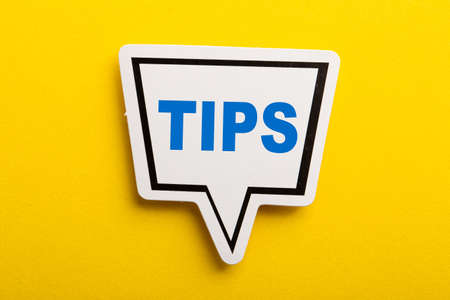 Tips speech bubble isolated on the yellow background.の写真素材