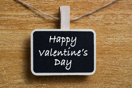 Happy Valentines Day text on blackboard sign.の写真素材