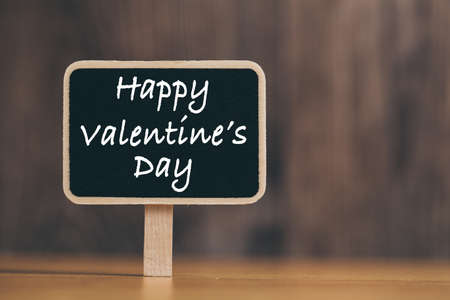 Happy Valentines Day text on blackboard sign.の写真素材