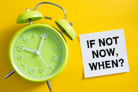 If Not Now When concept with clock aside.の写真素材