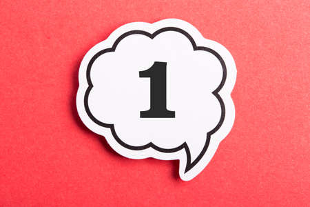 Number One Speech Bubble isolated on red background.の写真素材