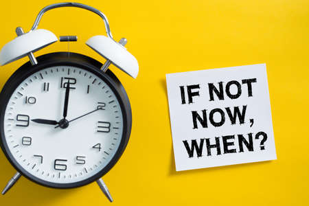 If Not Now When concept with clock aside.の写真素材