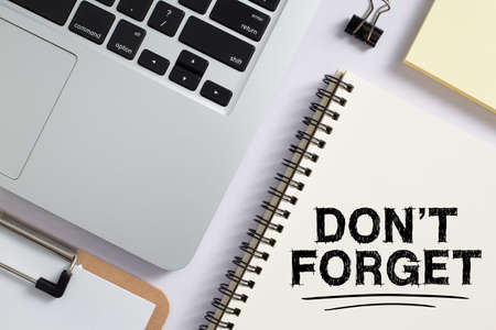 Do Not Forget Concept reminder on office desktop top view.の写真素材