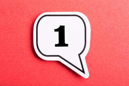 Number One Speech Bubble isolated on red background.の写真素材