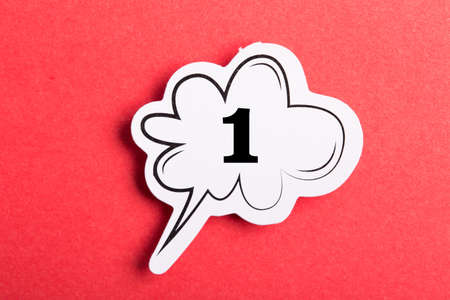 Number One Speech Bubble isolated on red background.の写真素材