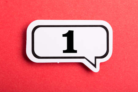 Number One Speech Bubble isolated on red background.の写真素材
