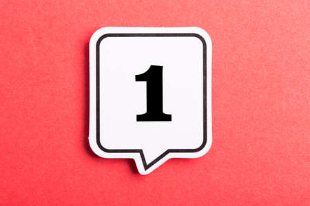 Number One Speech Bubble isolated on red background.の写真素材