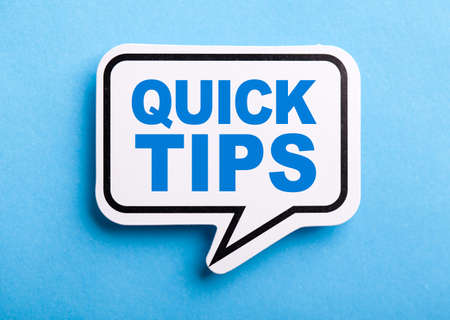 Quick Tips Concept speech bubble isolated on blue background.の写真素材