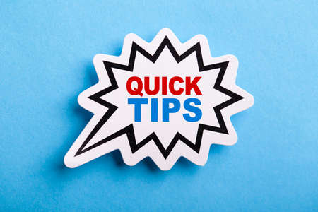 Quick Tips Concept speech bubble isolated on blue background.の写真素材