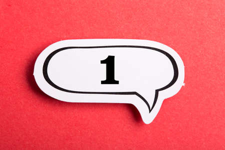 Number One Speech Bubble isolated on red background.の写真素材