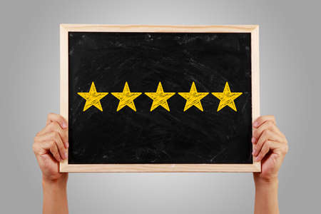 Five stars for review, increase rating or ranking, evaluation and classification concept.の写真素材