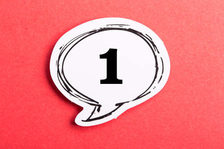 Number One Speech Bubble isolated on red background.の写真素材