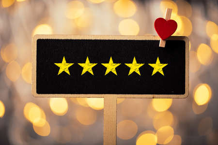 Five yellow stars concept black sign billboard isolated.の写真素材