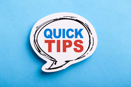 Quick Tips Concept speech bubble isolated on blue background.の写真素材