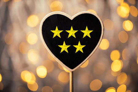 Five yellow stars concept black sign billboard isolated.の写真素材