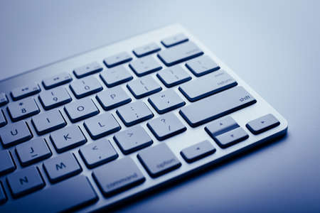 Closeup shot of keyboard with blue color.の写真素材