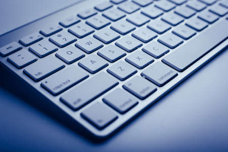 Closeup shot of keyboard with blue color.の写真素材