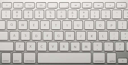 Closeup shot of white keyboard on white background.の写真素材