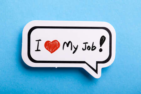 I Love My Job concept speech bubble isolated on blue background.の写真素材