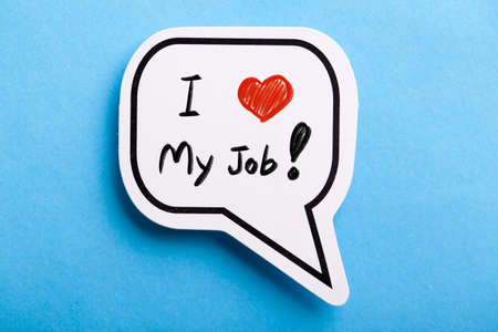 I Love My Job concept speech bubble isolated on blue background.の写真素材