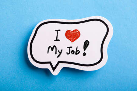 I Love My Job concept speech bubble isolated on blue background.の写真素材