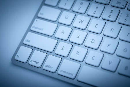 Closeup shot of keyboard with blue color.の写真素材