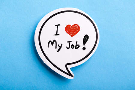 I Love My Job concept speech bubble isolated on blue background.の写真素材