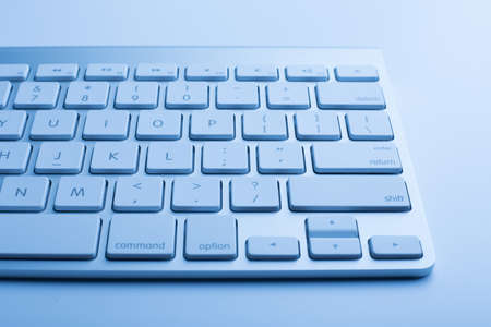 Closeup shot of keyboard with blue color.の写真素材