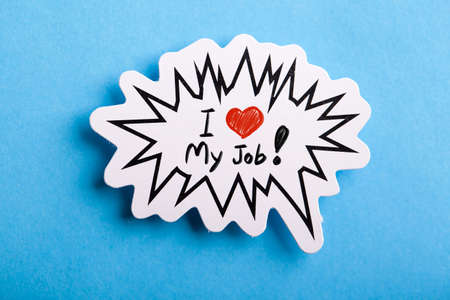 I Love My Job concept speech bubble isolated on blue background.の写真素材